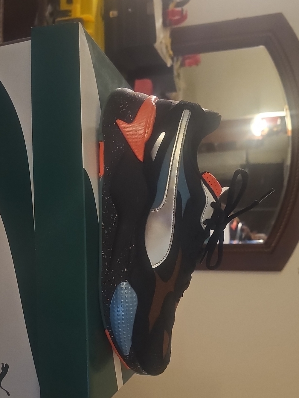 Puma Kids Black Sneakers with Orange and Silver Accents
